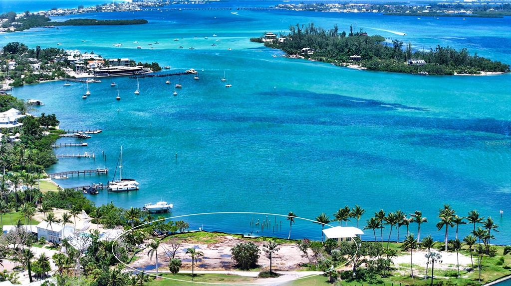 6516 Bayou Hammock Road Longboat Key, FL 34228 - Photo 9 of 20 a view of a houses with a yard