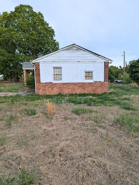 601 Farmers Mountain Road Gretna, VA 24557 - Photo 15 of 20 a view of a house with yard and a tree