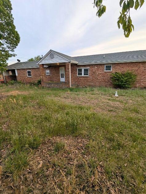 601 Farmers Mountain Road Gretna, VA 24557 - Photo 2 of 20 a front view of house with yard and green space