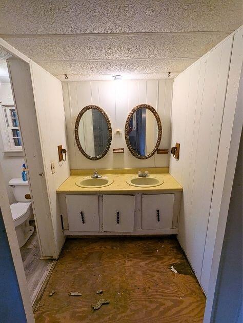 601 Farmers Mountain Road Gretna, VA 24557 - Photo 6 of 20 a bathroom with a granite countertop sink and a mirror