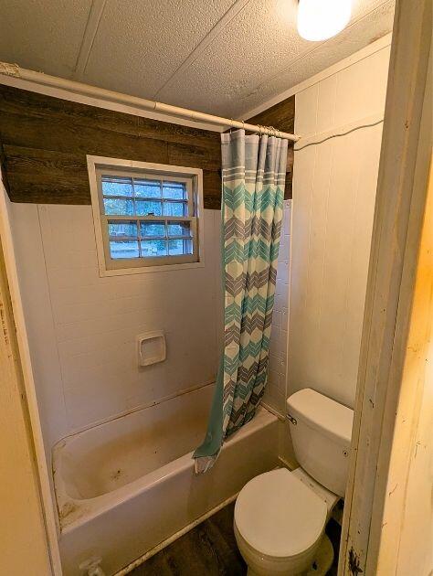 601 Farmers Mountain Road Gretna, VA 24557 - Photo 10 of 20 a bathroom with a toilet and shower