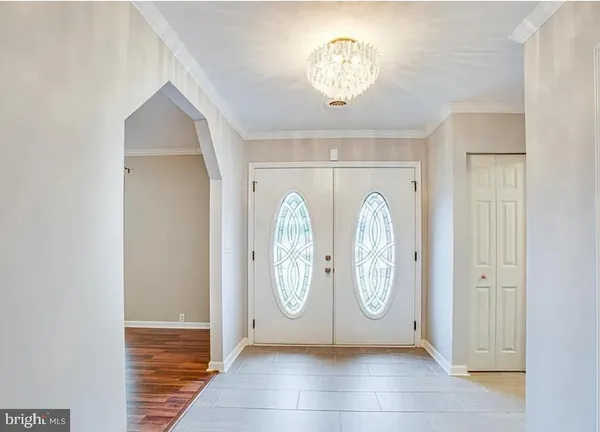 a view of a room with painted walls