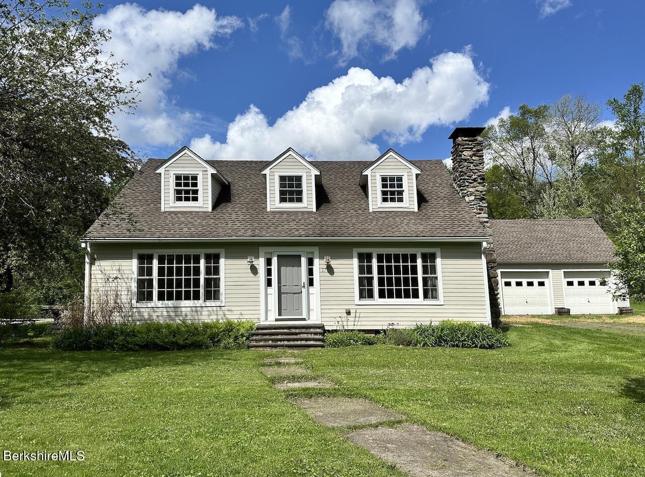 1786 South Undermountain Road Sheffield, MA 01257 - Photo 14 of 17 a front view of a house with a garden