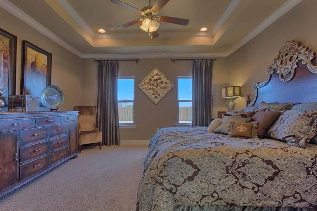 280 Maddox Street Santa Rosa Beach, FL 32459 - Photo 15 of 20 a bedroom with a bed and a chandelier