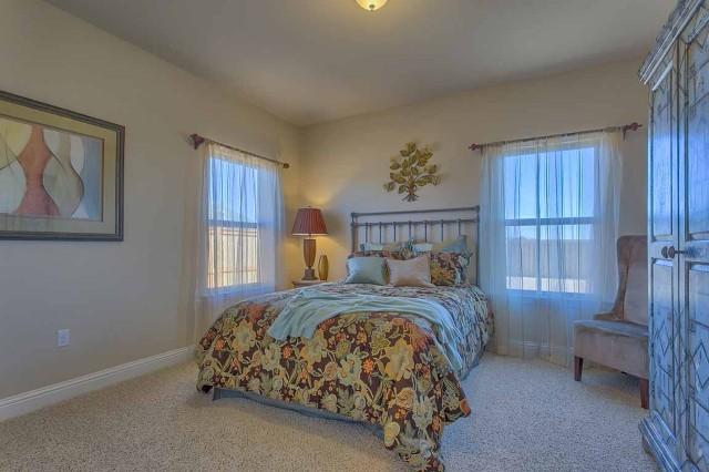 280 Maddox Street Santa Rosa Beach, FL 32459 - Photo 16 of 20 a bedroom with a bed and a window
