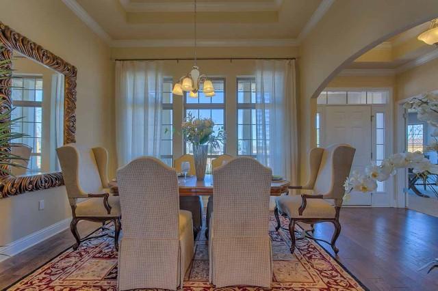 280 Maddox Street Santa Rosa Beach, FL 32459 - Photo 4 of 20 a view of a dining room with furniture window and wooden floor