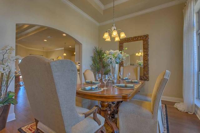 280 Maddox Street Santa Rosa Beach, FL 32459 - Photo 5 of 20 a view of a dining room with furniture and chandelier