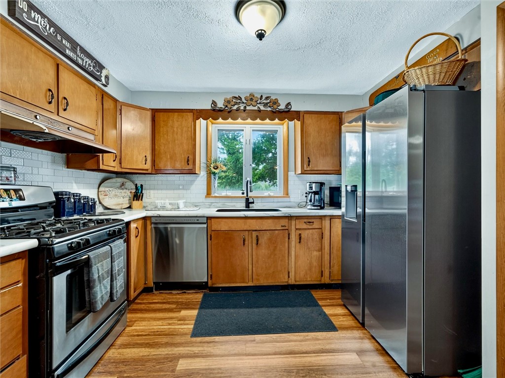 736 Paul Road Chili, NY 14624 - Photo 8 of 39 Kitchen with new counter and floors