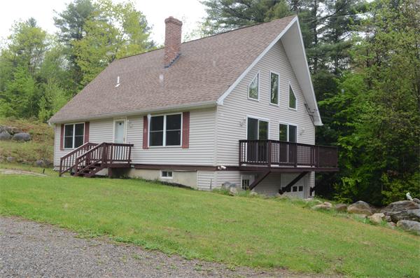 198 Ellis Road Westminster, MA 01473 - Photo 17 of 19 a front view of a house with a yard and trees