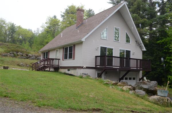 198 Ellis Road Westminster, MA 01473 - Photo 18 of 19 a view of a house with a yard and sitting area