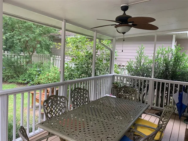 a view of balcony with furniture