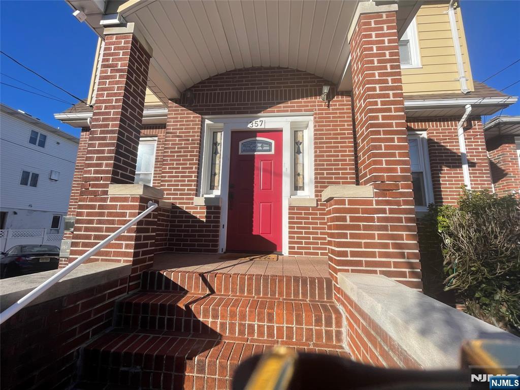 357 MacArthur Avenue, Unit 1 Garfield, NJ 07026 - Photo 3 of 11 a view of a balcony with door