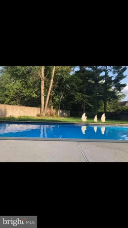 a view of swimming pool from window