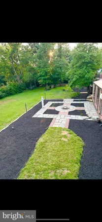 a view of a yard with an outdoor space