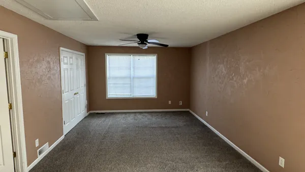 an empty room with windows
