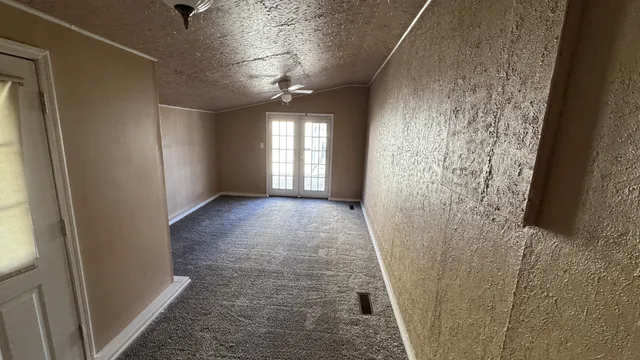 a view of entryway with window and stairs