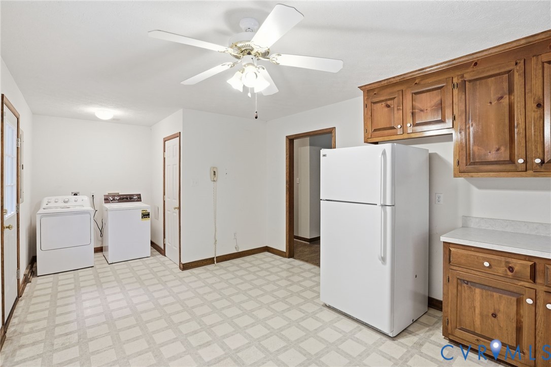 1917 Mahixon Road Manquin, VA 23106 - Photo 23 of 43 a view of a kitchen with refrigerator and cabinet