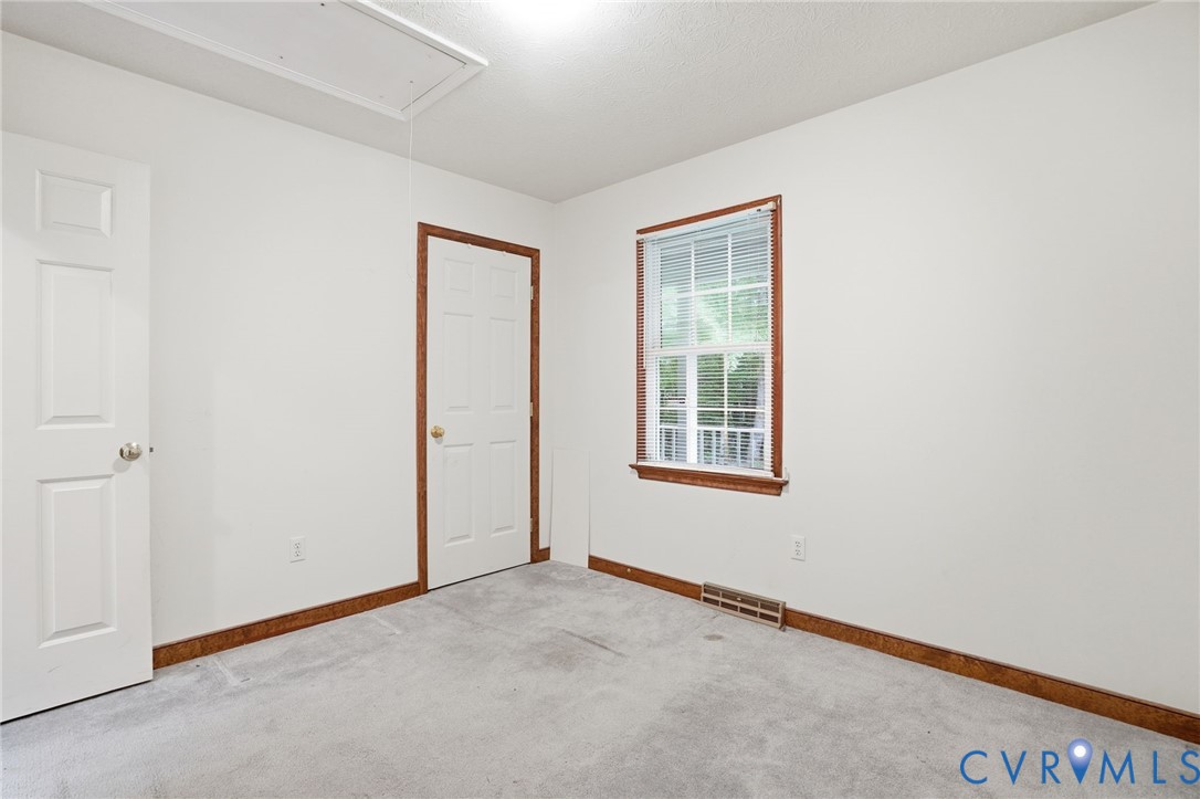 1917 Mahixon Road Manquin, VA 23106 - Photo 26 of 43 an empty room with windows