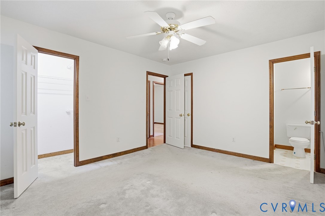 1917 Mahixon Road Manquin, VA 23106 - Photo 32 of 43 an empty room with a ceiling fan and a window