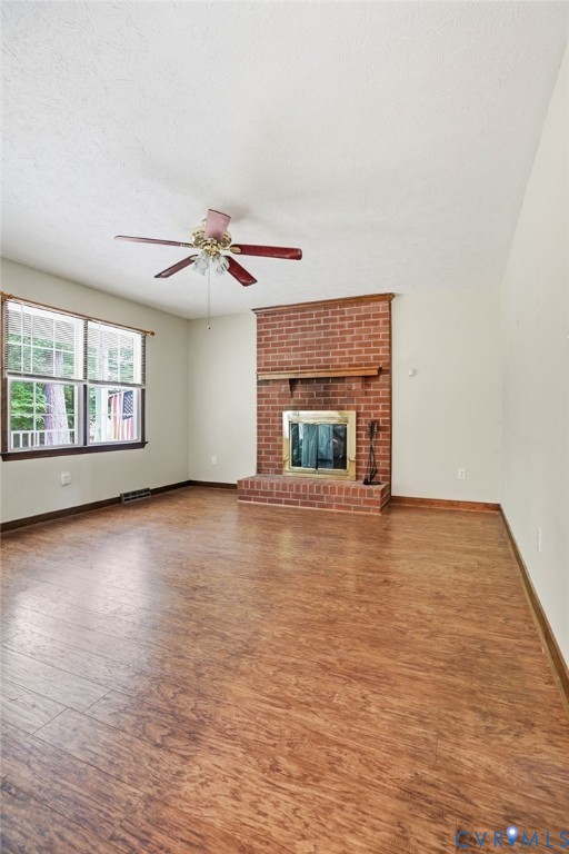 1917 Mahixon Road Manquin, VA 23106 - Photo 36 of 43 an empty room with windows and fireplace