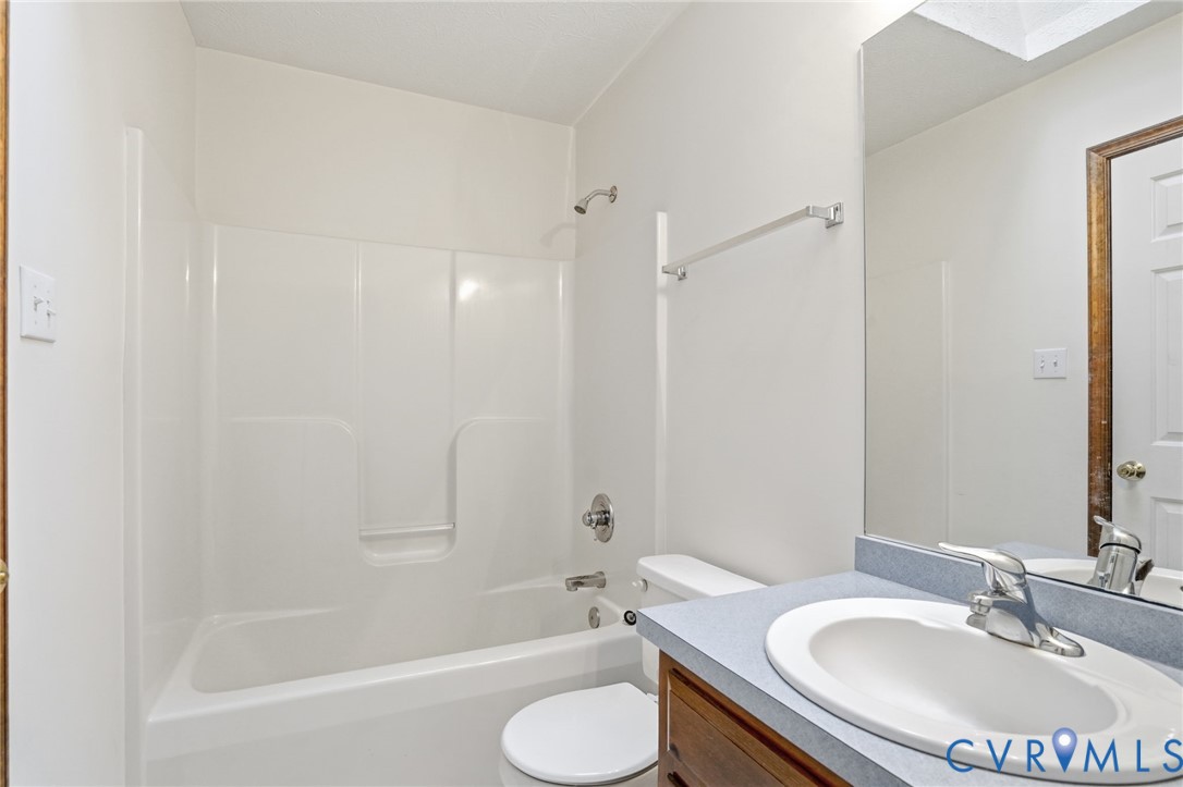 1917 Mahixon Road Manquin, VA 23106 - Photo 38 of 43 a bathroom with a sink toilet and shower