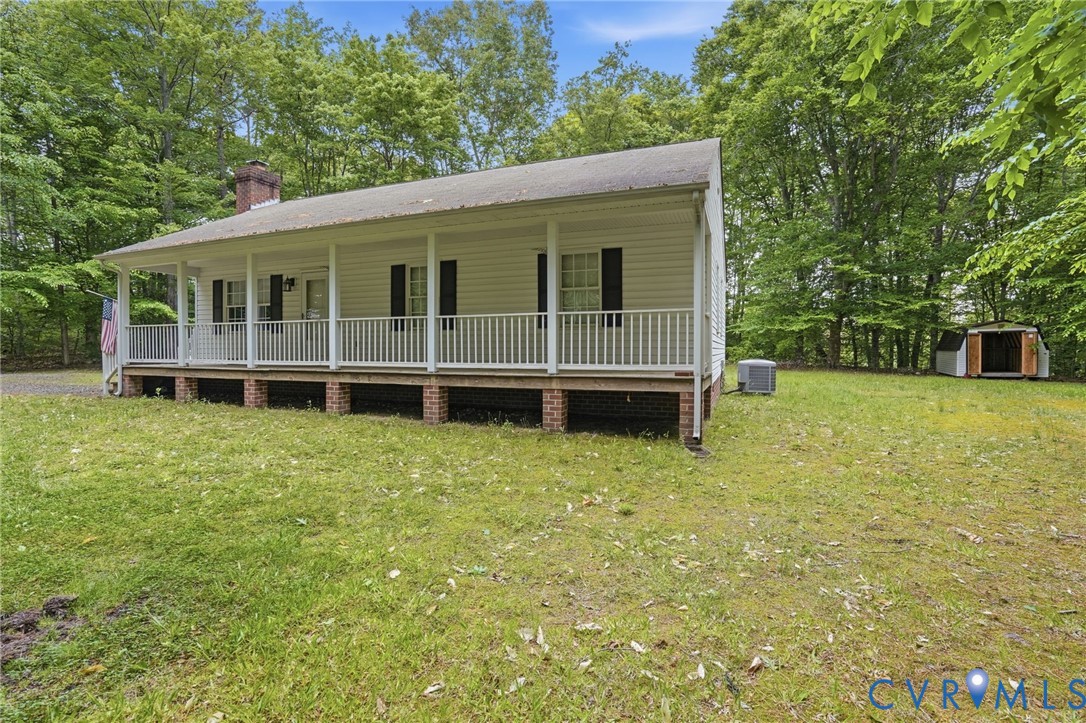 1917 Mahixon Road Manquin, VA 23106 - Photo 5 of 43 a view of a house with a garden