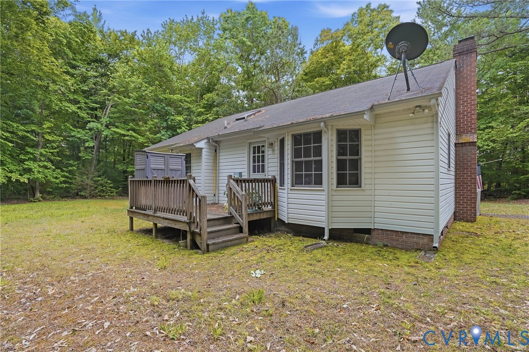 1917 Mahixon Road Manquin, VA 23106 - Photo 8 of 43 a view of a house with a yard and furniture