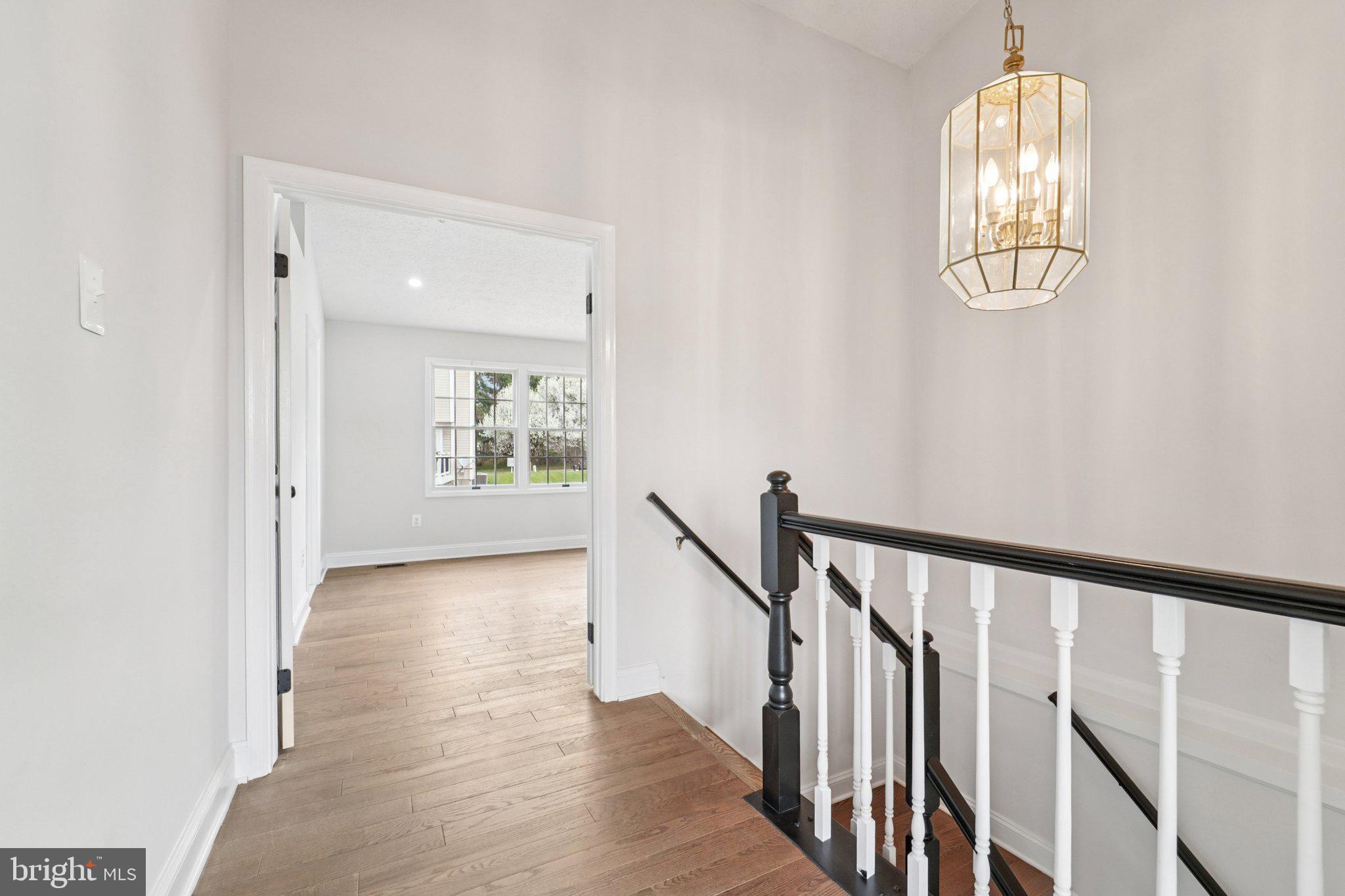 8727 Silver Hall Road Perry Hall, MD 21128 - Photo 12 of 35 a view of an entryway with wooden floor