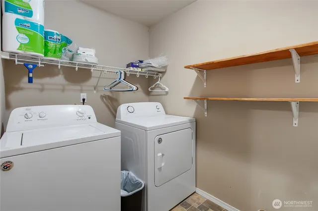 a utility room with dryer and washer