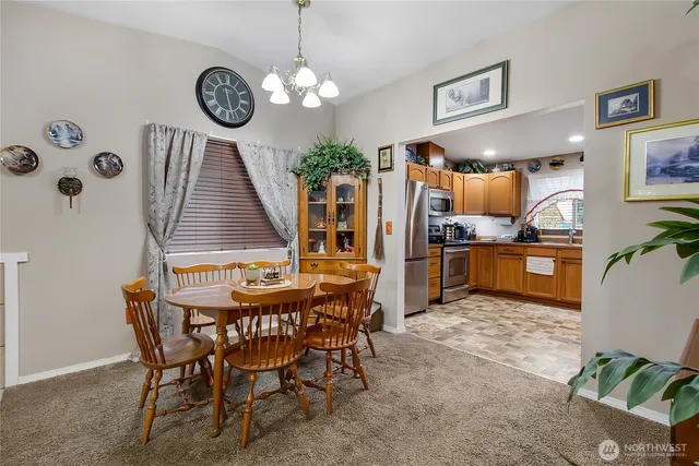 a view of a table and chairs in a room