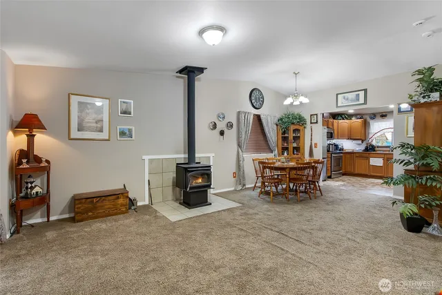 a view of a livingroom with furniture and a flat screen tv
