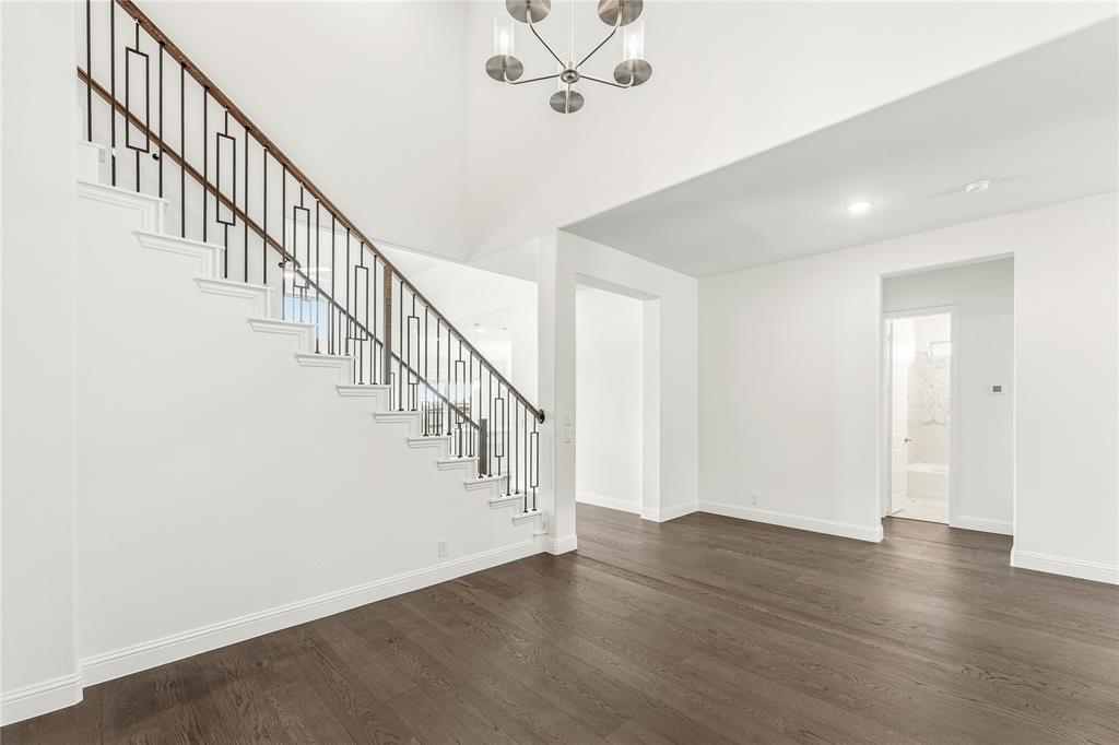 1145 Hitching Post Way Oak Point, TX 75068 - Photo 12 of 39 a view of an entryway with wooden floor