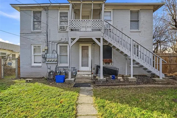a front view of house with outdoor space