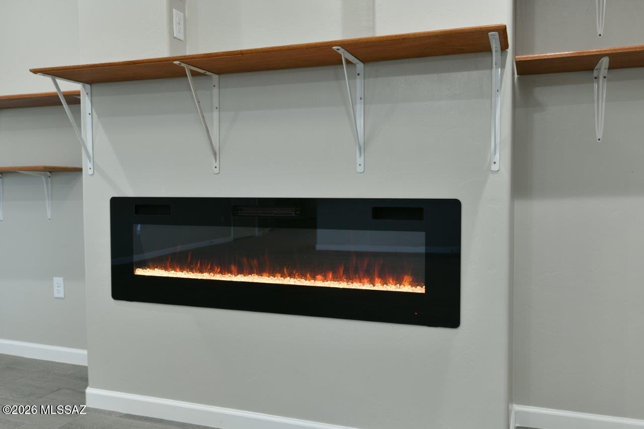 1091 North Vail View Road Vail, AZ 85641 - Photo 14 of 43 a close view of a fireplace