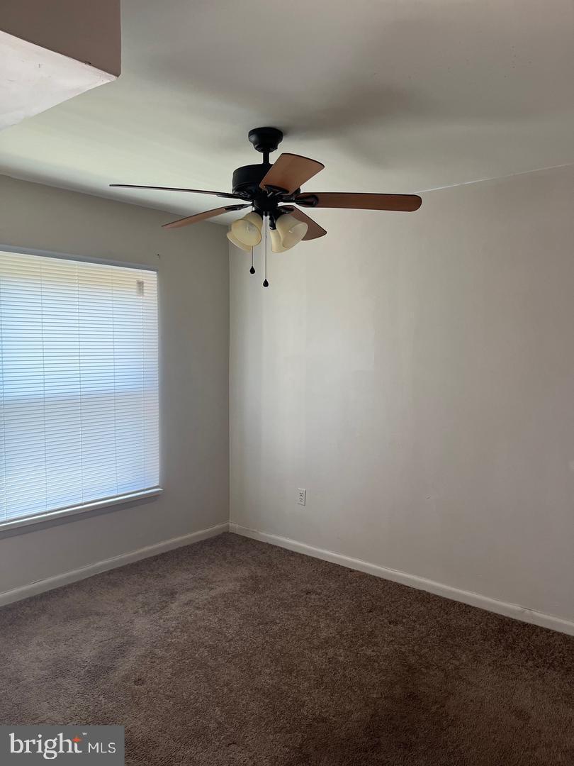 3827 St Barnabas Road, Unit 3831T Suitland, MD 20746 - Photo 6 of 11 a view of a small space with a fan