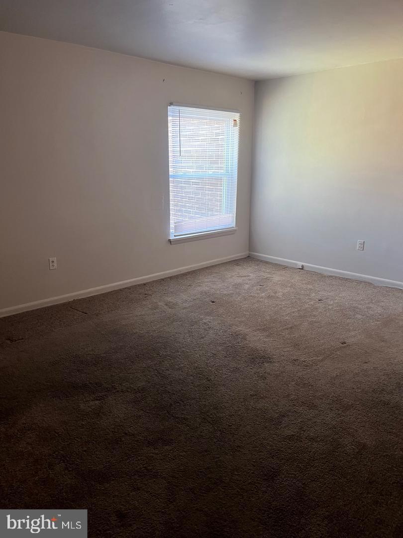 3827 St Barnabas Road, Unit 3831T Suitland, MD 20746 - Photo 9 of 11 an empty room with a window