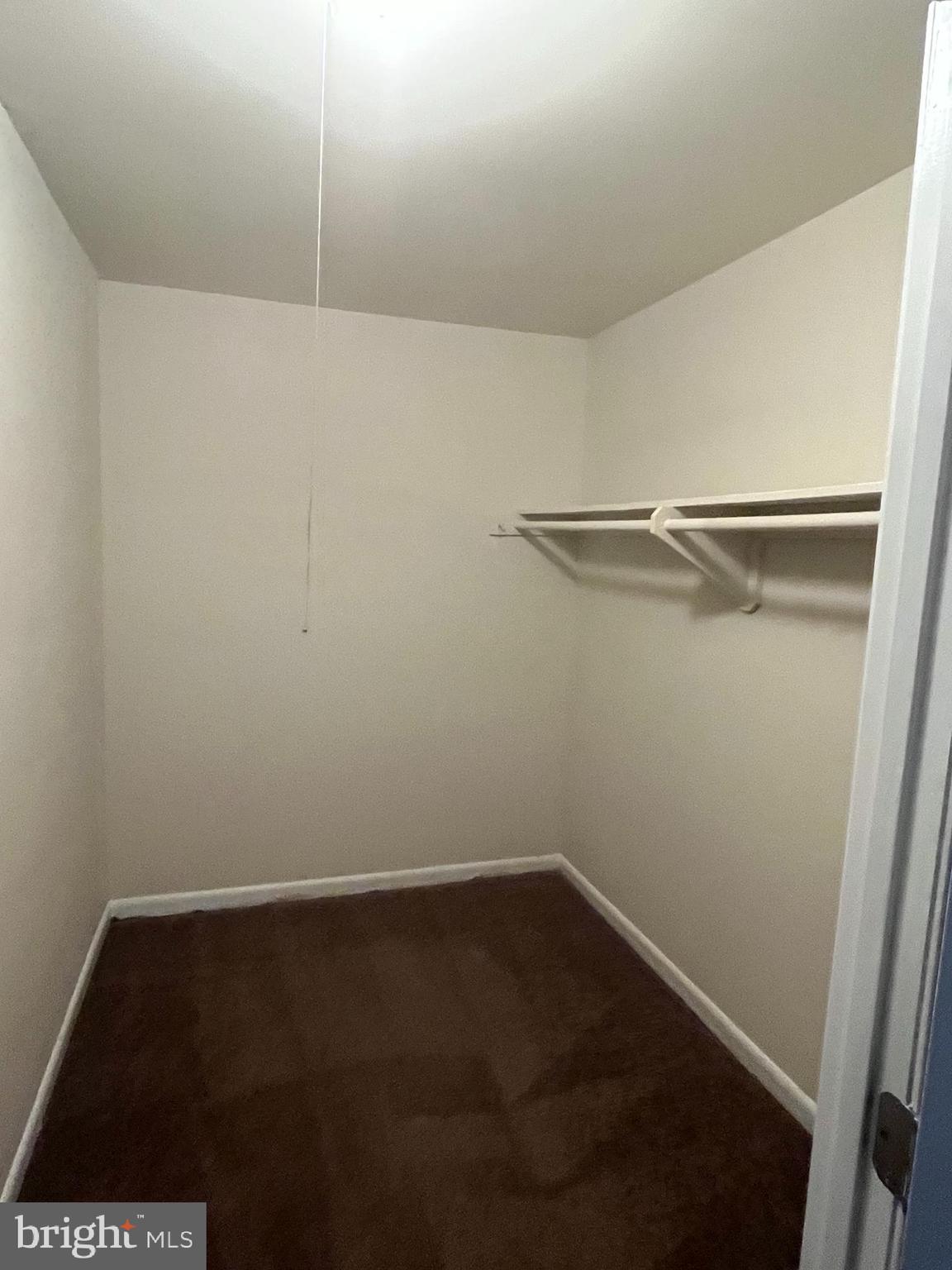 3827 St Barnabas Road, Unit 3831T Suitland, MD 20746 - Photo 10 of 11 a view of small space with racks on the wall