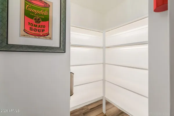 a bathroom with a sink a vanity and a mirror