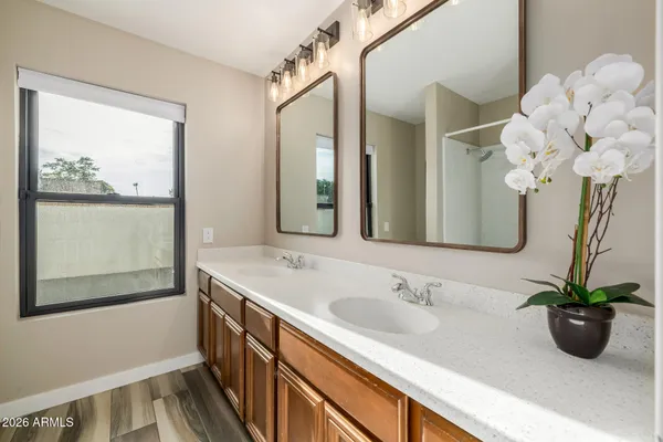 a view of a backyard with swimming pool