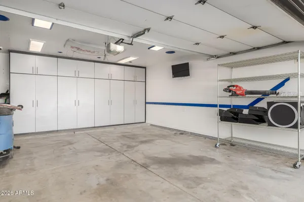 a swimming pool with outdoor seating yard and barbeque oven