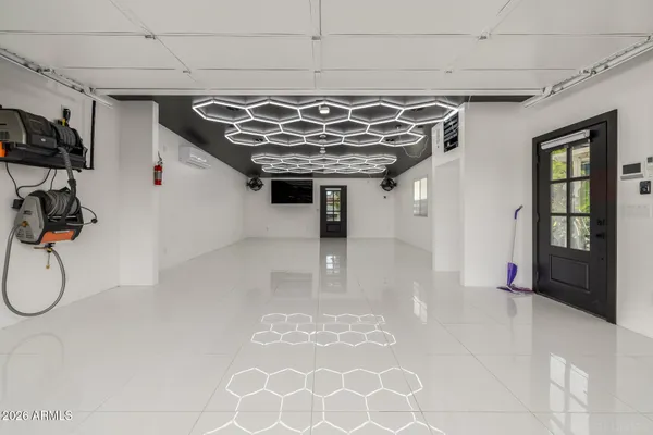 a view of a swimming pool and trees in the background