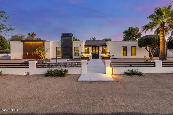 a view of a road with a garage