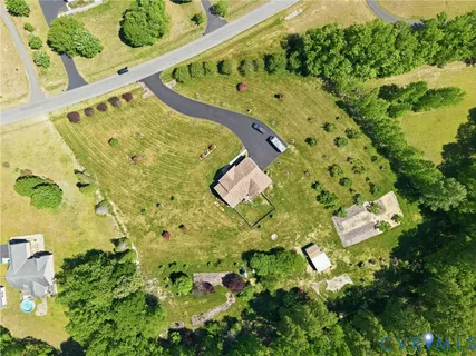 a view of swimming pool with a yard