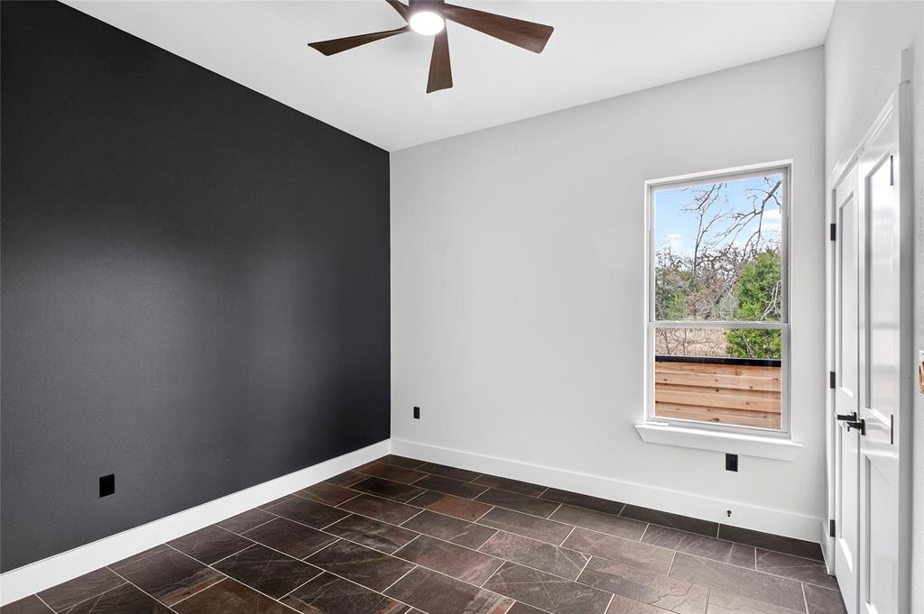 124 Aztec Drive Mabank, TX 75156 - Photo 24 of 33 Empty room with a ceiling fan and baseboards