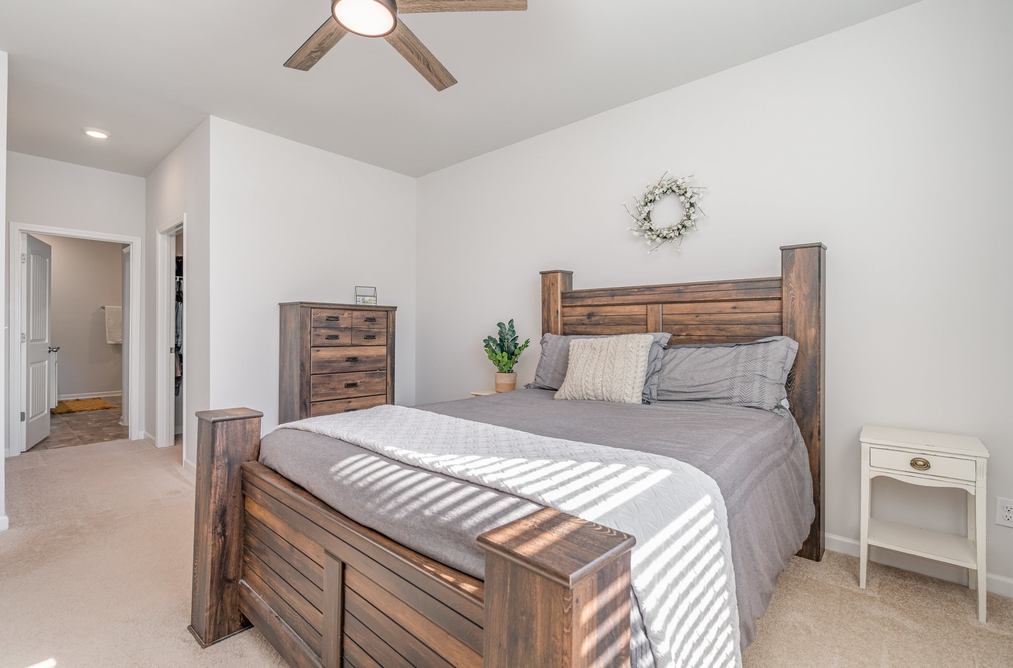 276 Addison Avenue Chapel Hill, TN 37034 - Photo 18 of 27 a bedroom with a bed and a chandelier