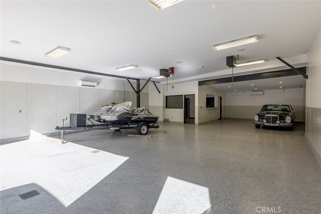 7157 Foothill Boulevard Tujunga, CA 91042 - Photo 6 of 20 a living room with furniture and a flat screen tv