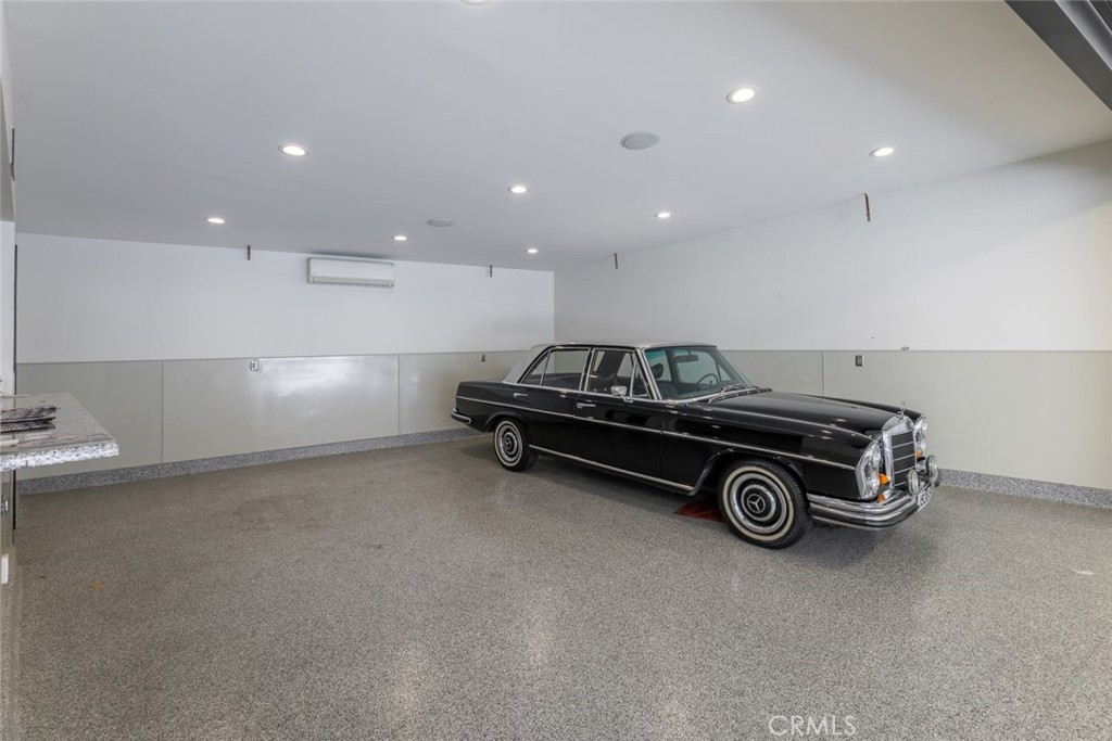 7157 Foothill Boulevard Tujunga, CA 91042 - Photo 7 of 20 a car parked in a parking room