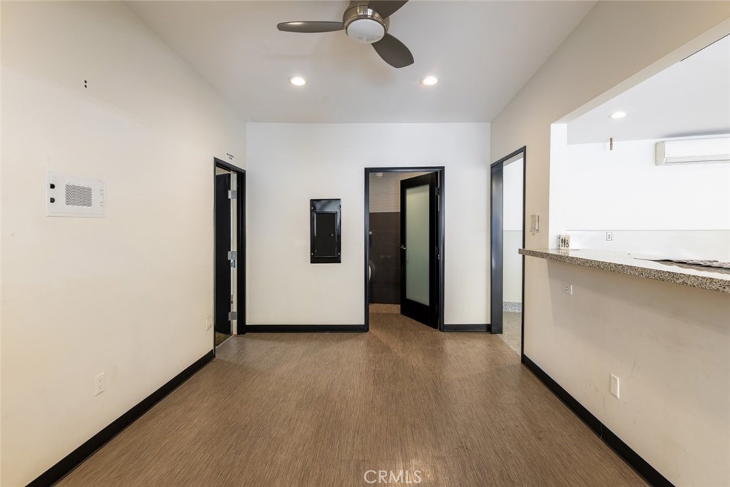 7157 Foothill Boulevard Tujunga, CA 91042 - Photo 10 of 20 a view of a livingroom with wooden floor