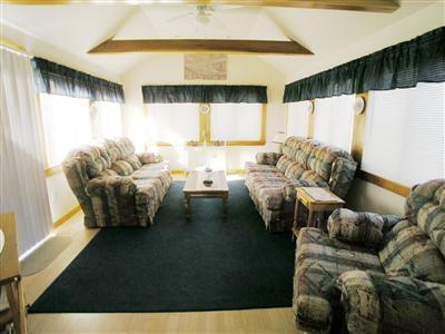 83 Uncle Rolf Road Dennis Port, MA 02639 - Photo 2 of 7 a living room with furniture and a large window