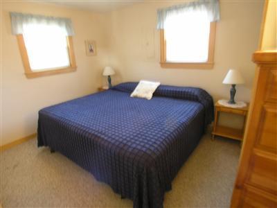83 Uncle Rolf Road Dennis Port, MA 02639 - Photo 4 of 7 a bedroom with a bed and window